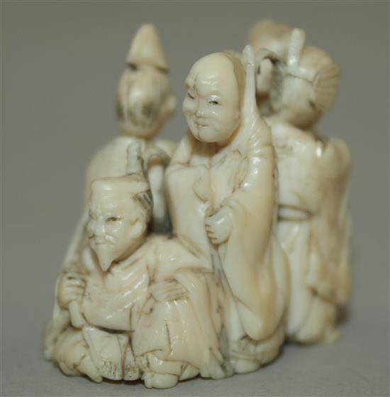 A Japanese small ivory okimono of six immortals, 3.3cm